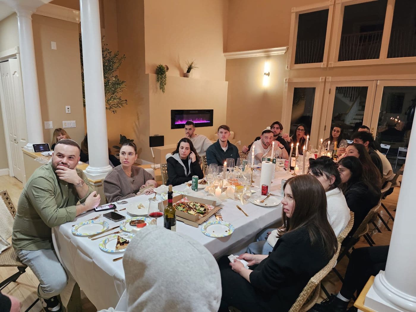 A festive dinner table with young guests